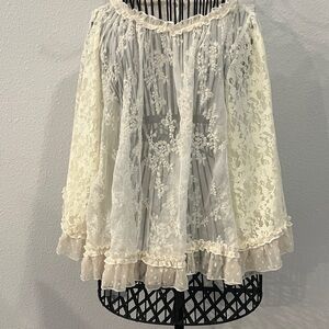Elegant Lace Blouse with Ruffle Details